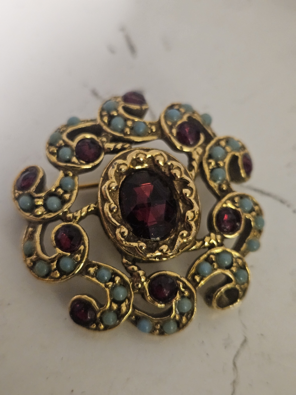 Gold-Tone Floral Brooch with Deep Red and Turquoise Accents